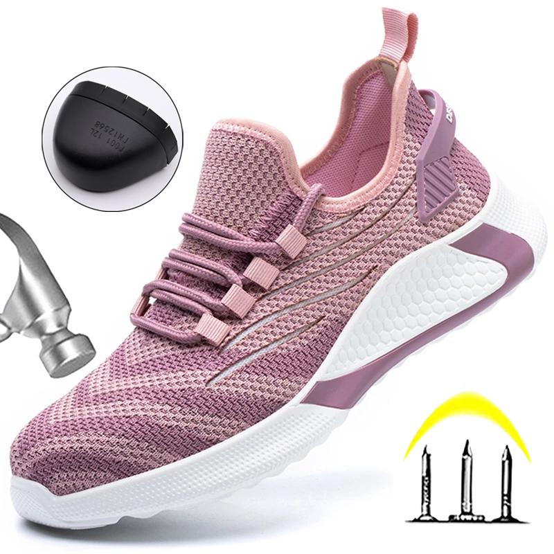 Photo représentant une basket de sécurité rose anti-écrasement et anti-crevaison pour femme sur un fond blanc