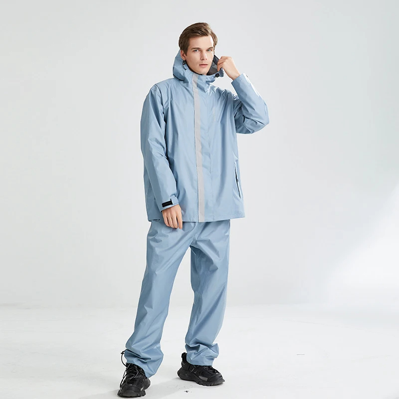 Combinaison de travail homme bleue à capuche sur fond gris